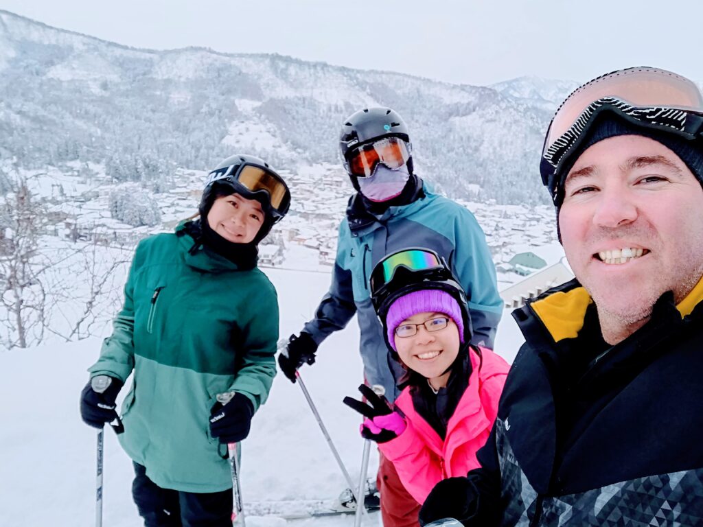 Group photo looking over Nozawa town.